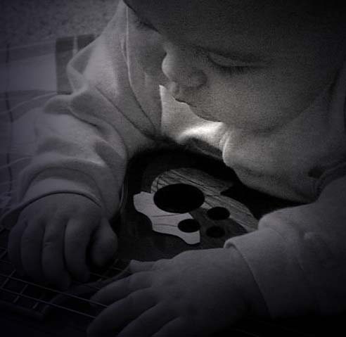taken 2 days before his 9th month bday - Thaddeus absolutely loves music !
